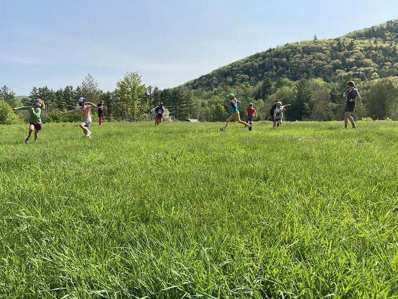 students playing in the field