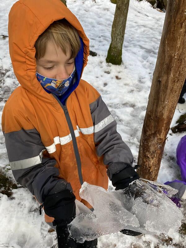 Student holding ice