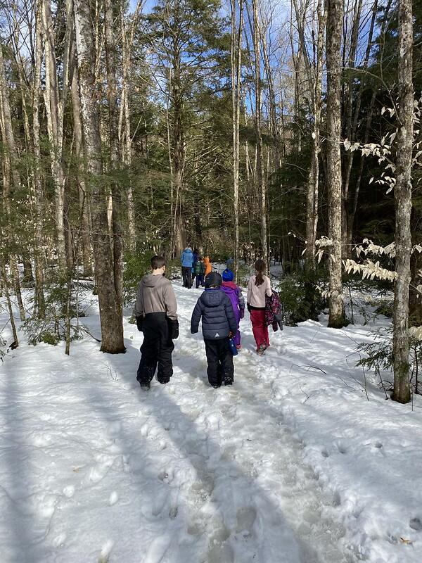 Students hiking on trail