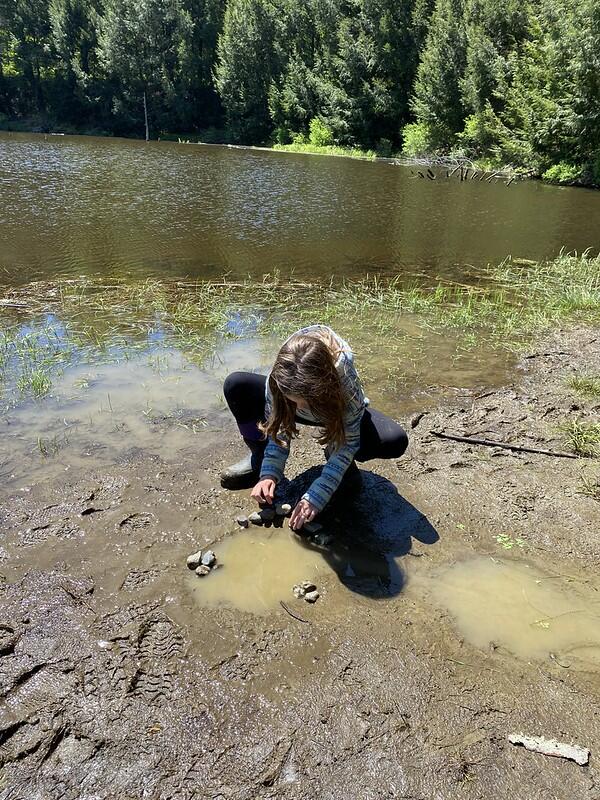 student working on nature basin for critters