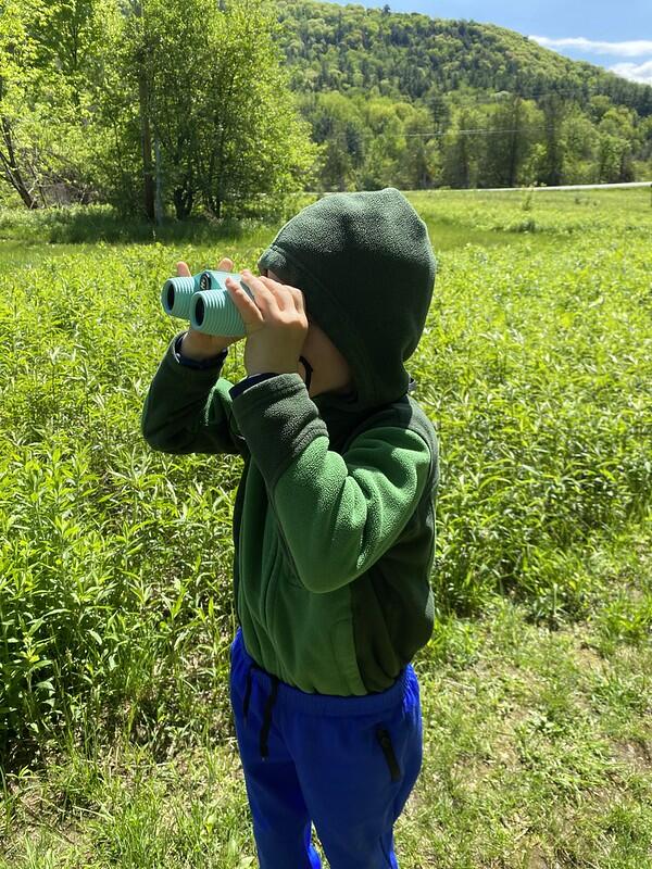 Student using binoculars