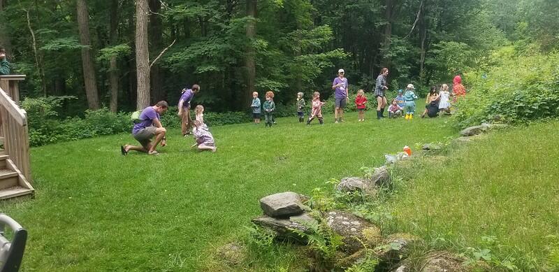 campers running in the backyard