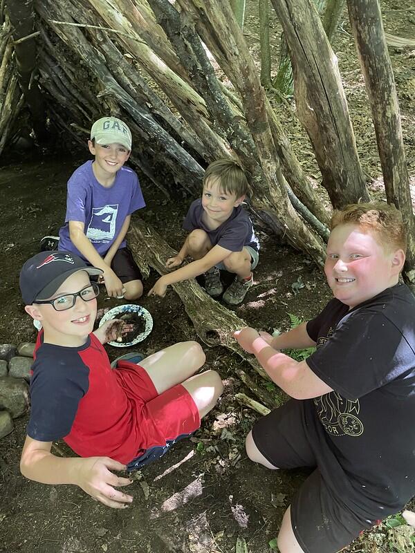 Campers "cooking" with mud
