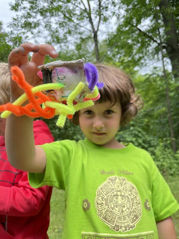 camper with spider craft