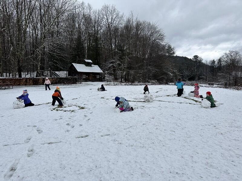 Students playing in the snow