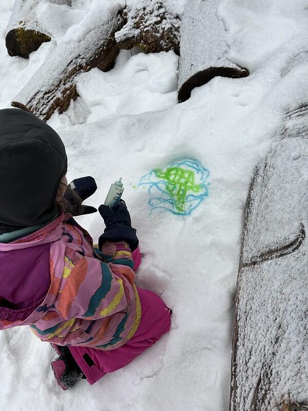 student snow painting