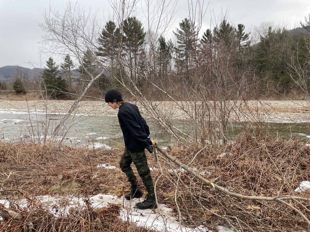 A JCT dragging brush along the River Trail.
