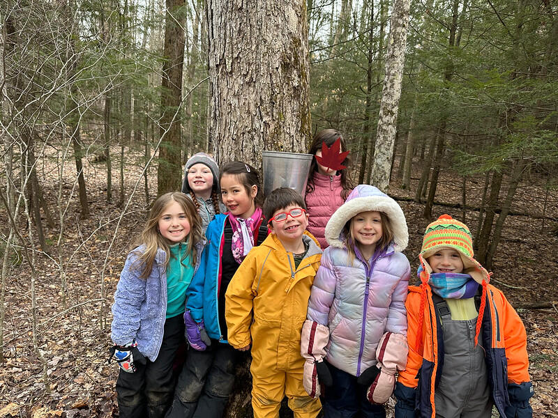 Students starting in front of tree