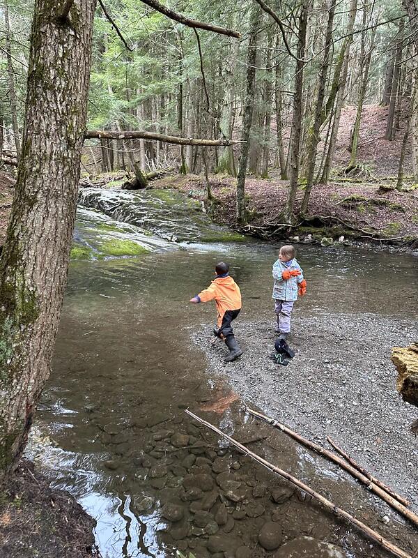 students skipping rocks