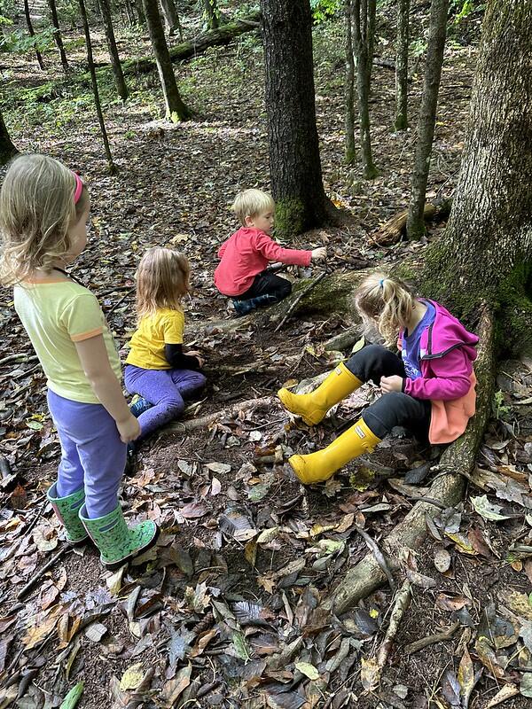 student building fairy houses