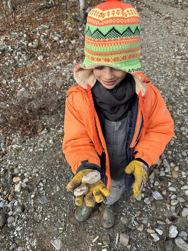 student holding rock