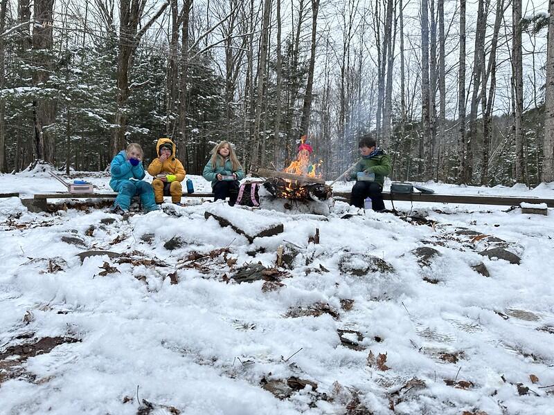 sitting around a fire sitting around a fire