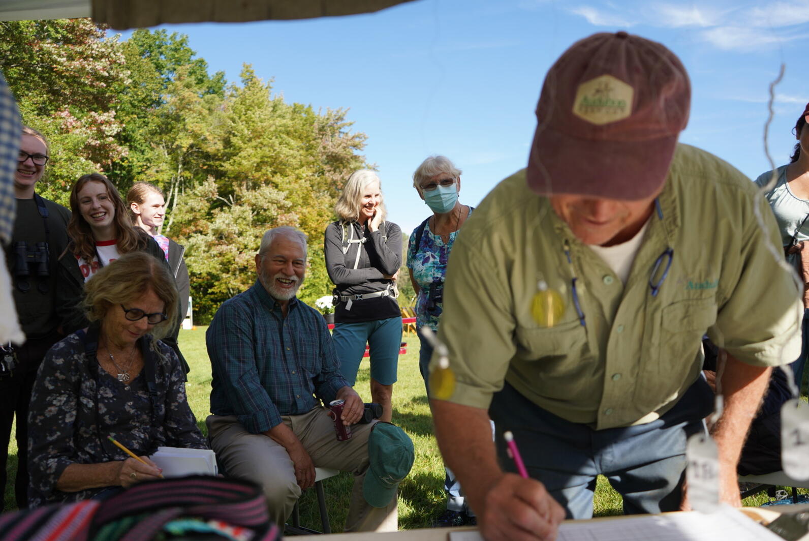 Conservation biologist Mark LaBarr bird banding at Audubon's Bird and Barn Festival.
