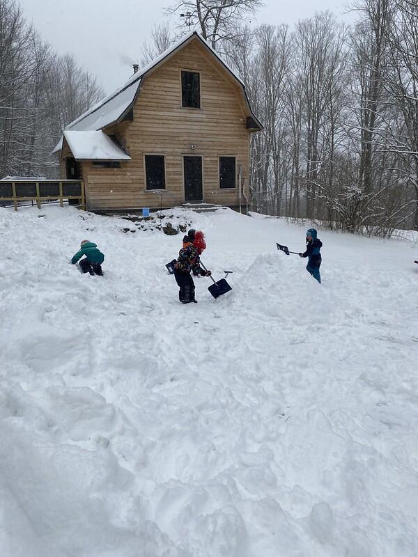 Children build a snow fort