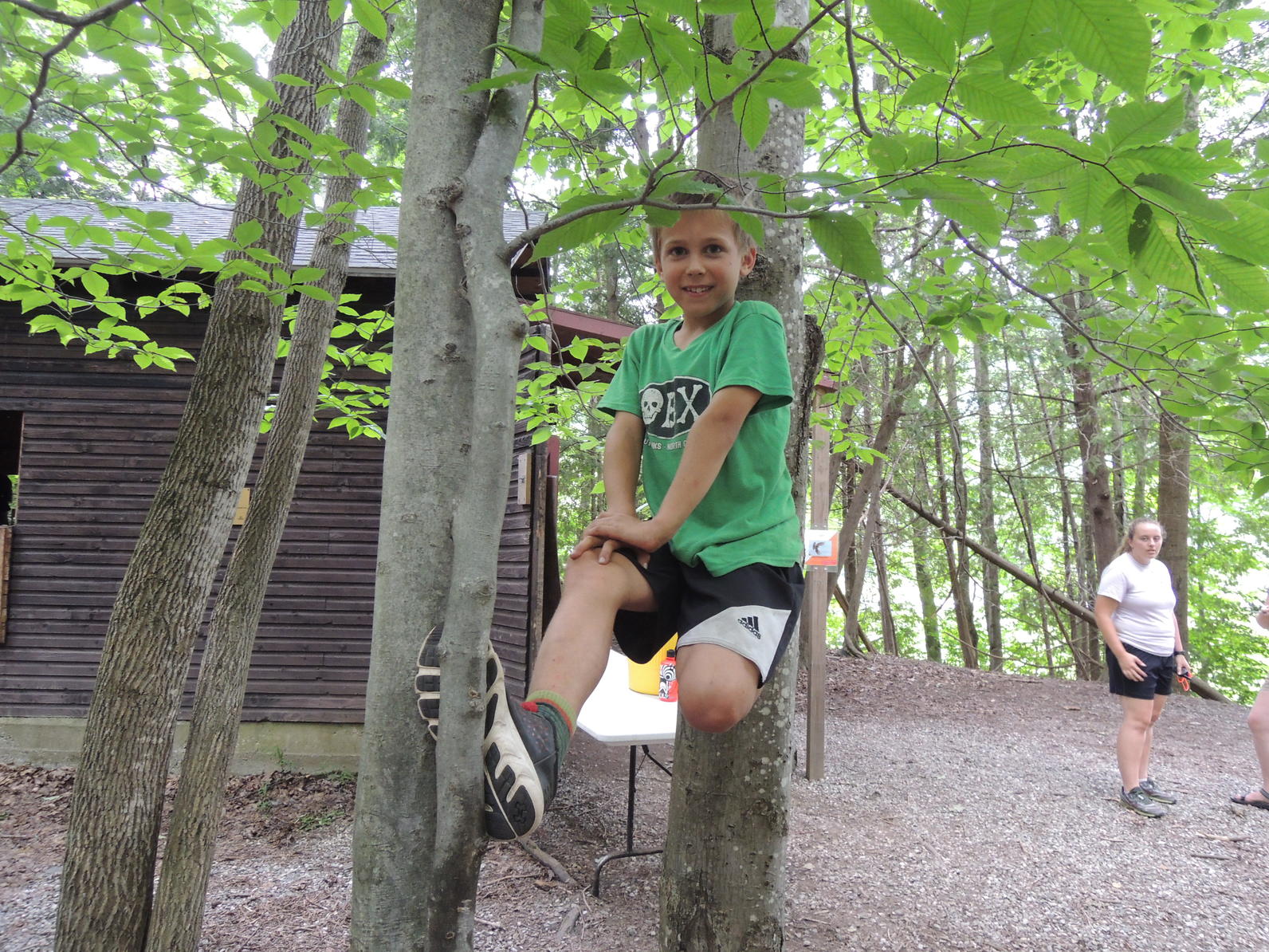 Camper climbing at camp