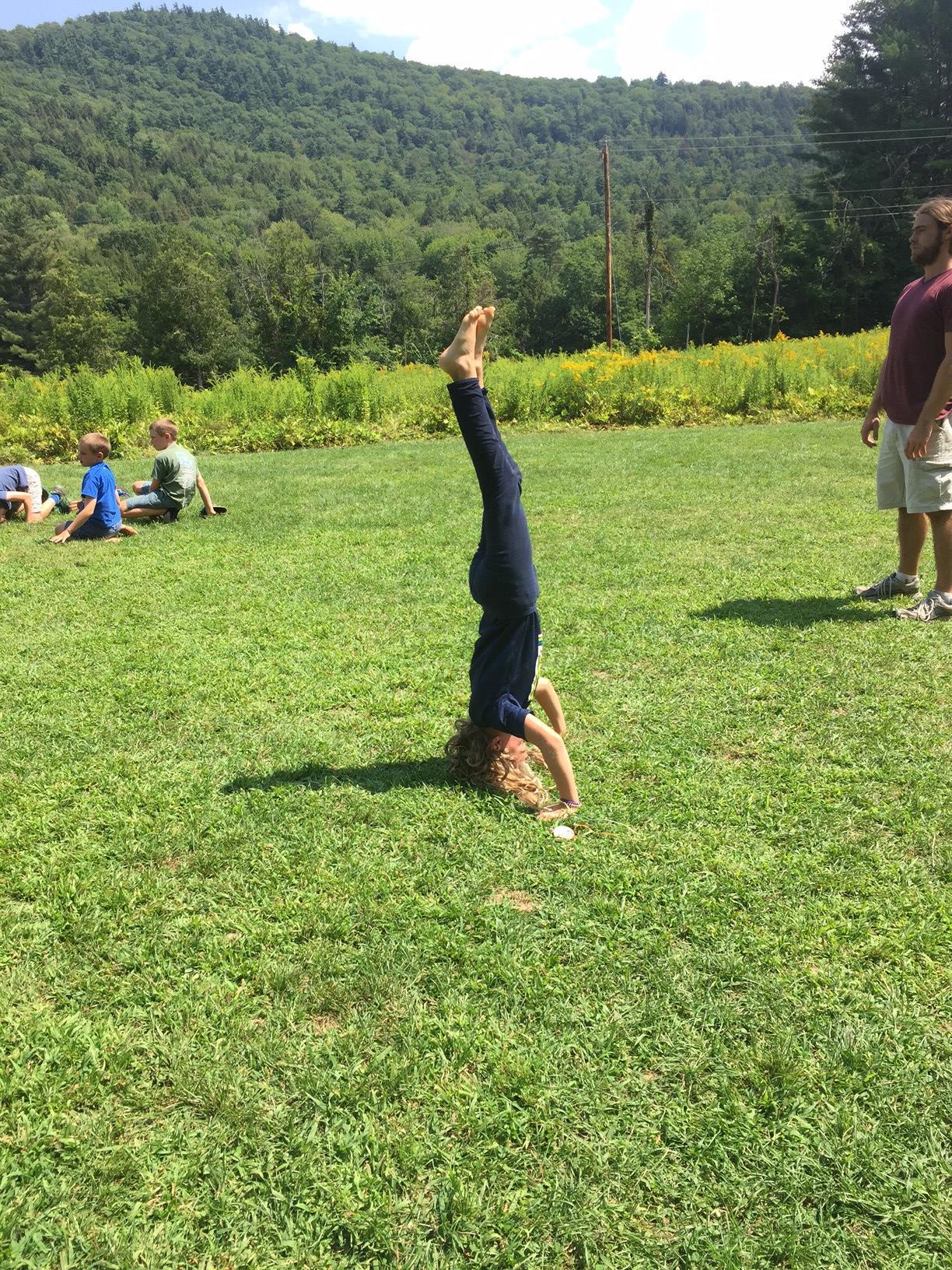 headstand camp 