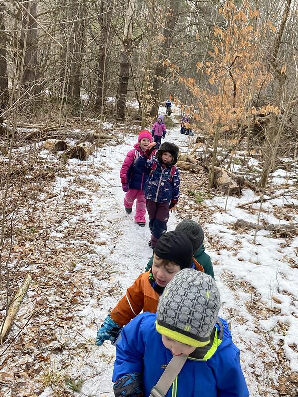 children hike on a path