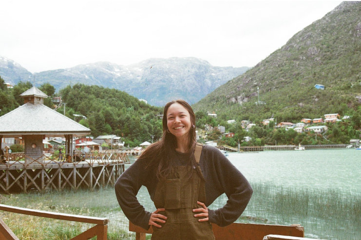 Sarah standing in front of a body of water